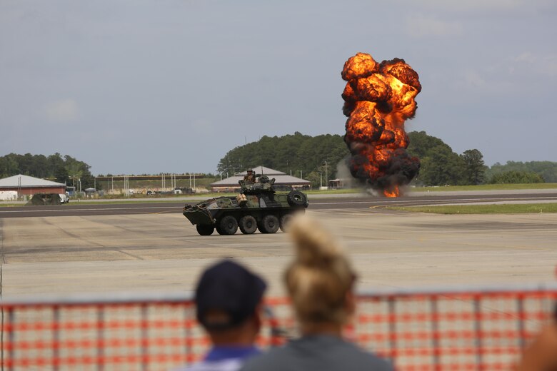 The Marine Air-Ground Task Force performs high speed demonstration on the flight line at the 2016 Marine Corps Air Station Cherry Point Air Show – “Celebrating 75 Years” at MCAS Cherry Point, N.C., May 1, 2016. The Marine Air-Ground Task Force is designed for swift deployment of Marine forces by air, land or sea. This year’s air show celebrated MCAS Cherry Point and 2nd Marine Aircraft Wing’s 75th anniversaries and featured 40 static displays, 17 aerial performers and a concert. (U.S. Marine Corps photo by Lance Cpl. Mackenzie Gibson/ Released)
