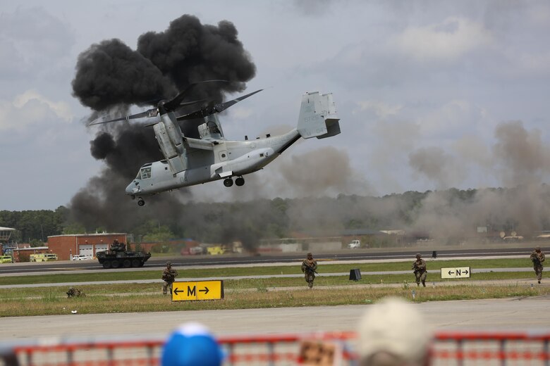 The Marine Air-Ground Task Force performs high speed demonstration on the flight line at the 2016 Marine Corps Air Station Cherry Point Air Show – “Celebrating 75 Years” at MCAS Cherry Point, N.C., May 1, 2016. The Marine Air-Ground Task Force is designed for swift deployment of Marine forces by air, land or sea. This year’s air show celebrated MCAS Cherry Point and 2nd Marine Aircraft Wing’s 75th anniversaries and featured 40 static displays, 17 aerial performers and a concert. (U.S. Marine Corps photo by Lance Cpl. Mackenzie Gibson/ Released)
