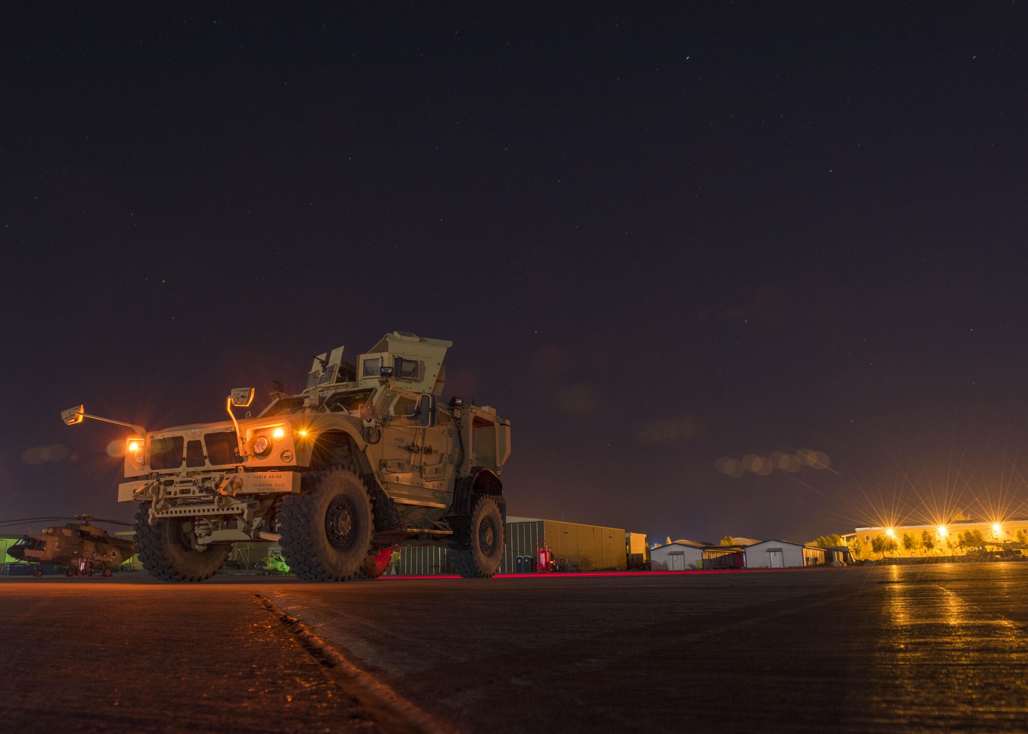 A mine-resistant ambush-protected (MRAP) all-terrain vehicle (M-ATV) from the 451st Expeditionary Support Squadron sits on the flightline at Kandahar Airfield, Afghanistan, May 05, 2016. Security Forces members at KAF are responsible for the security of more than 150 aircraft and $2.2 billion of resources. (U.S. Air Force photo by Senior Airman Justyn M. Freeman)