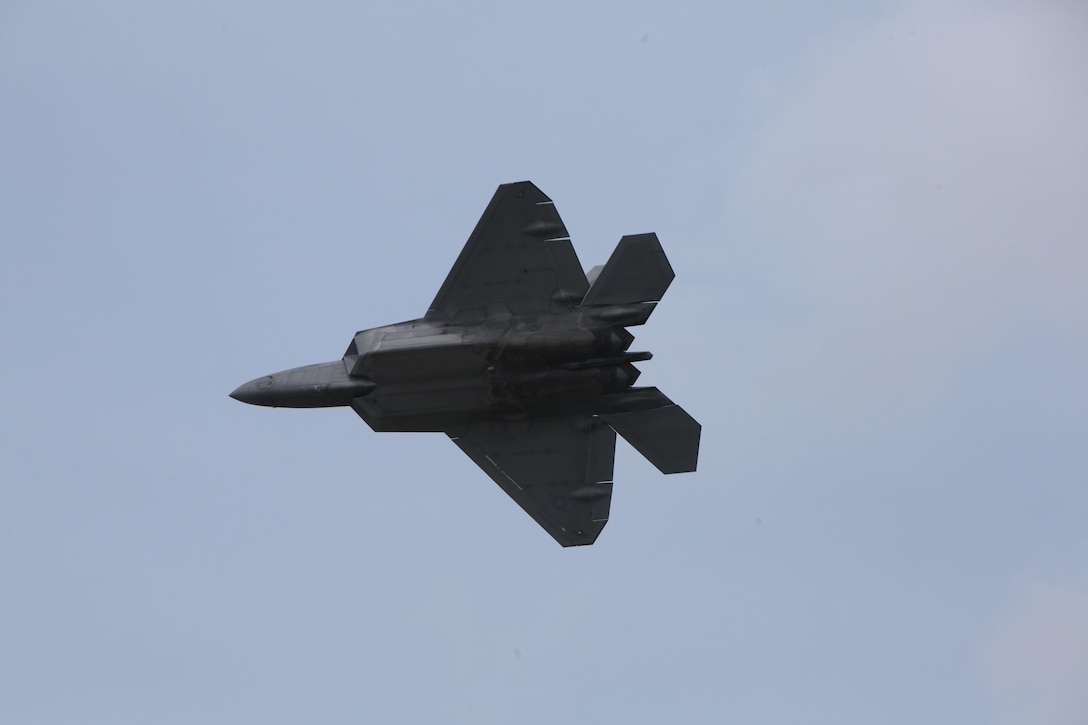 An F-22 Raptor soars through the sky and amazes airshow patrons at the 2016 Marine Corps Air Station Cherry Point Air Show – “Celebrating 75 Years” at MCAS Cherry Point, N.C., May 1, 2016. The Air Force’s F-22 Raptor combines sensor capabilities with integrated avionics, situational awareness and weapons to provide the first-kill opportunity against threats by performing air-to-air and air-to-ground missions. This year’s air show celebrated MCAS Cherry Point and 2nd Marine Aircraft Wing’s 75th anniversary and featured 40 static displays, 17 aerial performers, as well as a concert.