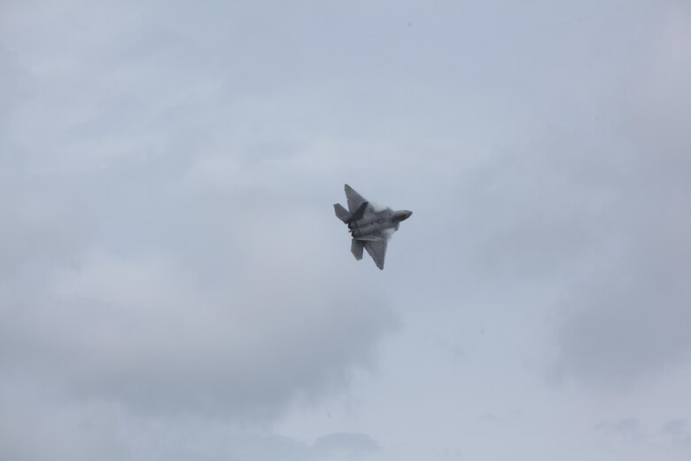 An F-22 Raptor soars through the sky and amazes airshow patrons at the 2016 Marine Corps Air Station Cherry Point Air Show – “Celebrating 75 Years” at MCAS Cherry Point, N.C., May 1, 2016. The Air Force’s F-22 Raptor combines sensor capabilities with integrated avionics, situational awareness and weapons to provide the first-kill opportunity against threats by performing air-to-air and air-to-ground missions. This year’s air show celebrated MCAS Cherry Point and 2nd Marine Aircraft Wing’s 75th anniversary and featured 40 static displays, 17 aerial performers, as well as a concert.