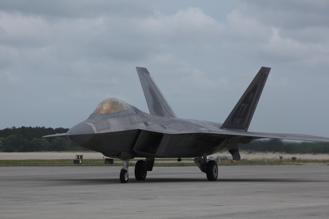 An F-22 Raptor sits on the flight line at the 2016 Marine Corps Air Station Cherry Point Air Show – “Celebrating 75 Years” at MCAS Cherry Point, N.C., May 1, 2016. The Air Force’s F-22 Raptor combines sensor capabilities with integrated avionics, situational awareness and weapons to provide the first-kill opportunity against threats by performing air-to-air and air-to-ground missions. This year’s air show celebrated MCAS Cherry Point and 2nd Marine Aircraft Wing’s 75th anniversary and featured 40 static displays, 17 aerial performers, as well as a concert.