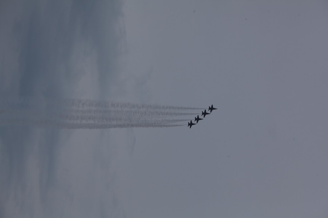 The U.S. Navy Blue Angels fly through the sky at the 2016 Marine Corps Air Station Cherry Point Air Show -- "Celebrating 75 Years" at MCAS Cherry Point, N.C., April 30, 2016. Blue Angels showcase the pride and professionalism of the Navy and the Marine Corps by inspiring a culture of excellence and service to country through flight demonstrations and community outreach. This year’s air show celebrated MCAS Cherry Point and 2nd Marine Aircraft Wing’s 75th anniversary and featured 40 static displays, 17 aerial performers, as well as a concert. 
