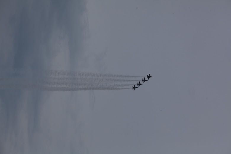 The U.S. Navy Blue Angels fly through the sky at the 2016 Marine Corps Air Station Cherry Point Air Show -- "Celebrating 75 Years" at MCAS Cherry Point, N.C., April 30, 2016. Blue Angels showcase the pride and professionalism of the Navy and the Marine Corps by inspiring a culture of excellence and service to country through flight demonstrations and community outreach. This year’s air show celebrated MCAS Cherry Point and 2nd Marine Aircraft Wing’s 75th anniversary and featured 40 static displays, 17 aerial performers, as well as a concert. 