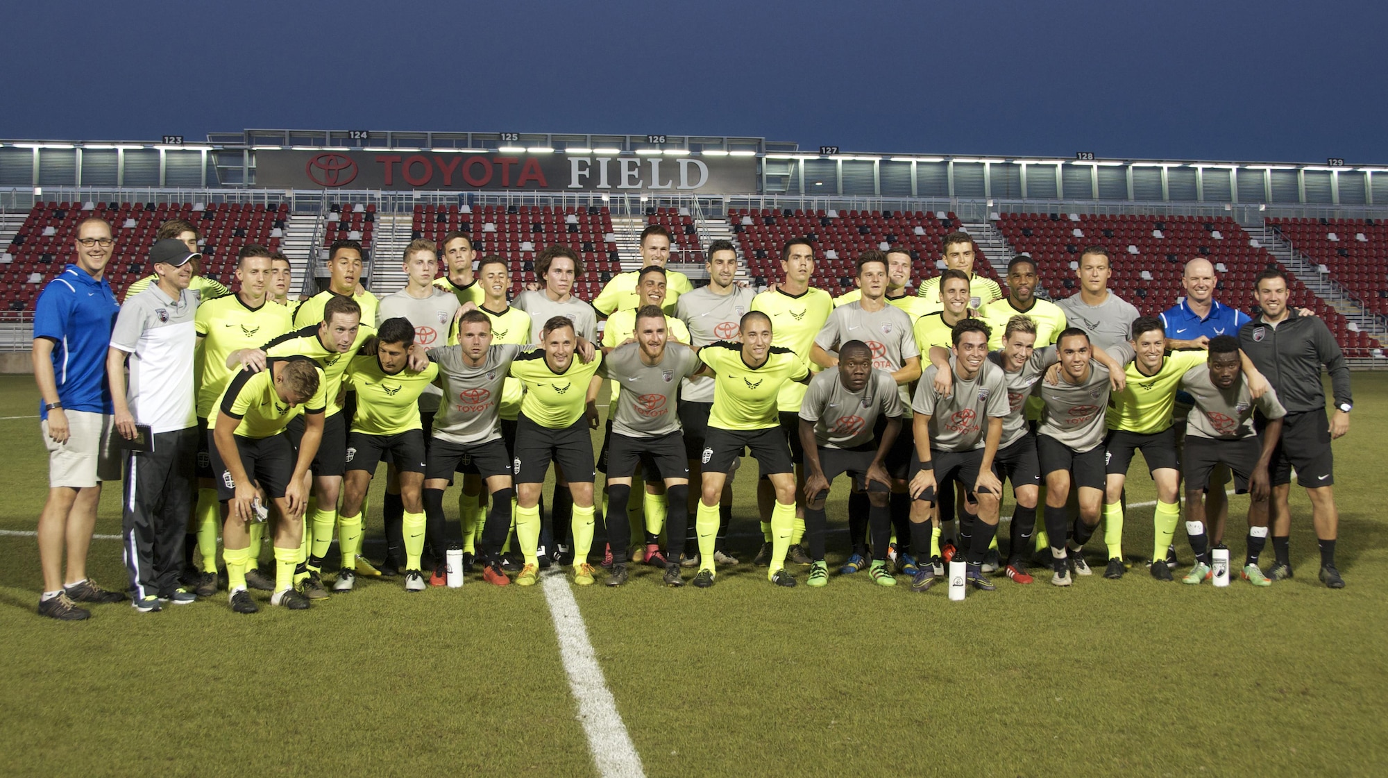 The All-Air Force men's soccer team and the San Antonio Football Club pose for a group photo after their exhibition match May 4 at Toyota Field in San Antonio. SAFC won, 3-0, and the Air Force team closed its training camp with a 12-4 record. The Air Force team is competing in the Armed Forces Championships through May 14 at Fort Benning, Georgia. (U.S. Air Force photo/Carole Chiles Fuller/Released)
