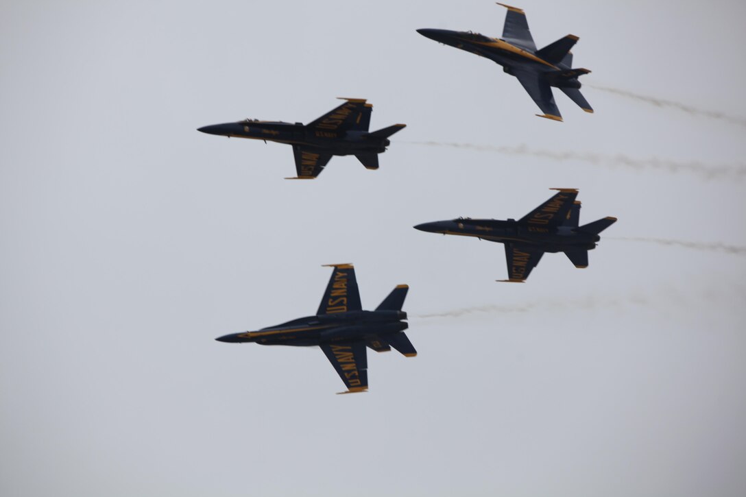 The U.S. Navy Blue Angels fly through the sky during the 2016 Marine Corps Air Station Cherry Point Air Show -- "Celebrating 75 Years" at MCAS Cherry Point , N.C., April 30, 2016. Blue Angels showcase the pride and professionalism of the Navy and the Marine Corps by inspiring a culture of excellence and service to country through flight demonstrations and community outreach. This year’s air show celebrated MCAS Cherry Point and 2nd Marine Aircraft Wing’s 75th anniversary and featured 40 static displays, 17 aerial performers, as well as a concert. 