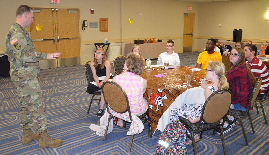 Maj. Gen. Patrick J. Reinert, 88th RSC commanding general, speaks with military children during the Yellow Ribbon Event in Bloomington, Minn., May 7. “Soldier Speak”, an 88th RSC Yellow Ribbon Program highlight, allows children of military families an opportunity to ask a Soldier questions and share concerns, challenges and stories. The children ranged in age from thirteen to eighteen years old. Reinert met the children’s curiosity with openness and honesty, sharing his own personal experiences and encouraging the children to talk about their concerns as well as their accomplishments. Reinert also presented each military child with an “All American Hero” award during a children’s program in honor of their unique strengths and sacrifices.