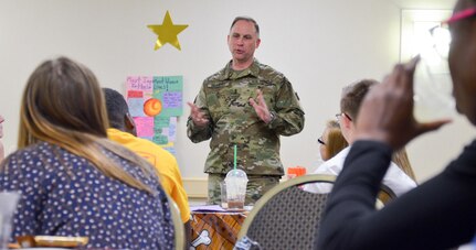 Maj. Gen. Patrick J. Reinert, 88th RSC commanding general, speaks with military children during the Yellow Ribbon Event in Bloomington, Minn., May 7. “Soldier Speak”, an 88th RSC Yellow Ribbon Program highlight, allows children of military families an opportunity to ask a Soldier questions and share concerns, challenges and stories. The children ranged in age from thirteen to eighteen years old. Reinert met the children’s curiosity with openness and honesty, sharing his own personal experiences and encouraging the children to talk about their concerns as well as their accomplishments. Reinert also presented each military child with an “All American Hero” award during a children’s program in honor of their unique strengths and sacrifices.