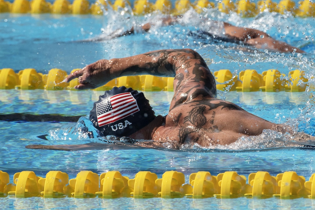 Air Force veteran Leonard Anderson competes in the freestyle preliminary swim competition during the 2016 Invictus Games in Orlando, Fla., May 7, 2016. DoD photo by Roger Wollenberg