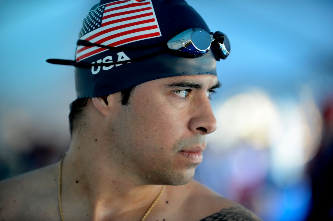 Air Force Staff Sgt. August O’Niell catches  his breathe after participating in a preliminary swim competition at the 2016 Invictus Games in Orlando, Fla., May 7, 2016. Air Force photo by Staff Sgt. Carlin Leslie