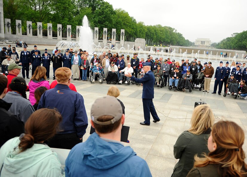 Lt. Gen. Arnold W. Bunch Jr., the military deputy for the Air Force’s assistant secretary for acquisition, speaks to the Georgia Honor Flight and onlookers at the National World War II Memorial in Washington, D.C., April 30, 2016. The Georgia Honor Flight was one of many such flights to visit the nation’s capital through the Honor Flight Network. (U.S. Air Force photo/Tech. Sgt. Bryan Franks)