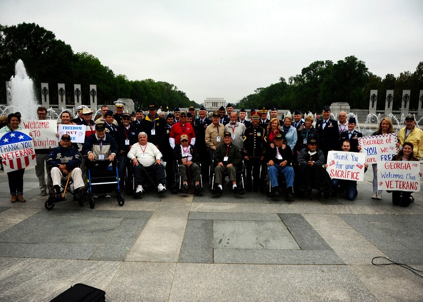 Service members and civilians thank World War II veterans for their service at the National World War II Memorial in Washington, D.C., during an Honor Flight ceremony April 30, 2016. The Honor Flight Network is a nonprofit organization dedicated to transporting America’s veterans to the nation’s capital to visit the memorials. (U.S. Air Force photo/Tech. Sgt. Bryan Franks)