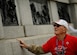 Paul Bowker, a World War II Army veteran, views the bronze artwork depicting the battles fought during World War II as he heads to the heart of the National World War II Memorial in Washington, D.C., April 30, 2016. Bowker is part of the Honor Flight Network’s Syracuse flight. (U.S. Air Force photo/Tech. Sgt. Bryan Franks)