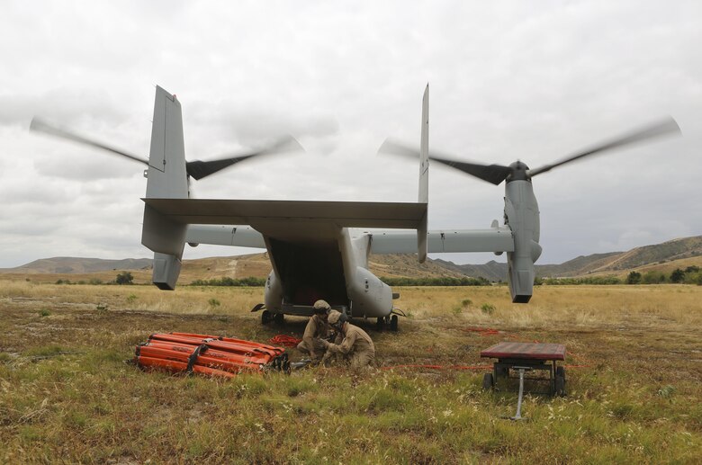 Marines with Marine Medium Tiltrotor Squadron (VMM) 165 prepare the Bambi bucket for the 2016 Wildland Firefighting Exercise aboard Marine Corps Base Camp Pendleton, Calif., May 5. The exercise was a multiaircraft operation with both ground and air units working together for maximum firefighting efforts. (U.S. Marine Corps photo by Lance Cpl. Harley Robinson/Released)