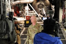 A member of the Air Force Reserve Command's 302nd Airlift Wing at Peterson AFB, Colo. informs the media of the U.S. Forest Service Modular Airborne Fire 
Fighting System on board a C-130 H3 aircraft.  The 302nd AW is one of four airlift wings providing Department of Defense MAFFS capabilities that will 
attend aerial firefighting training at Channel Islands Air National Guard Station, Calif, May 1-7.
