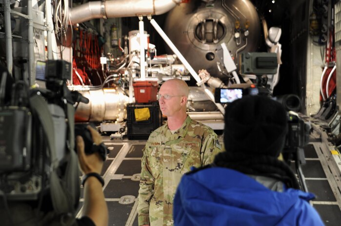 A member of the Air Force Reserve Command's 302nd Airlift Wing at Peterson AFB, Colo. informs the media of the U.S. Forest Service Modular Airborne Fire 
Fighting System on board a C-130 H3 aircraft.  The 302nd AW is one of four airlift wings providing Department of Defense MAFFS capabilities that will 
attend aerial firefighting training at Channel Islands Air National Guard Station, Calif, May 1-7.
