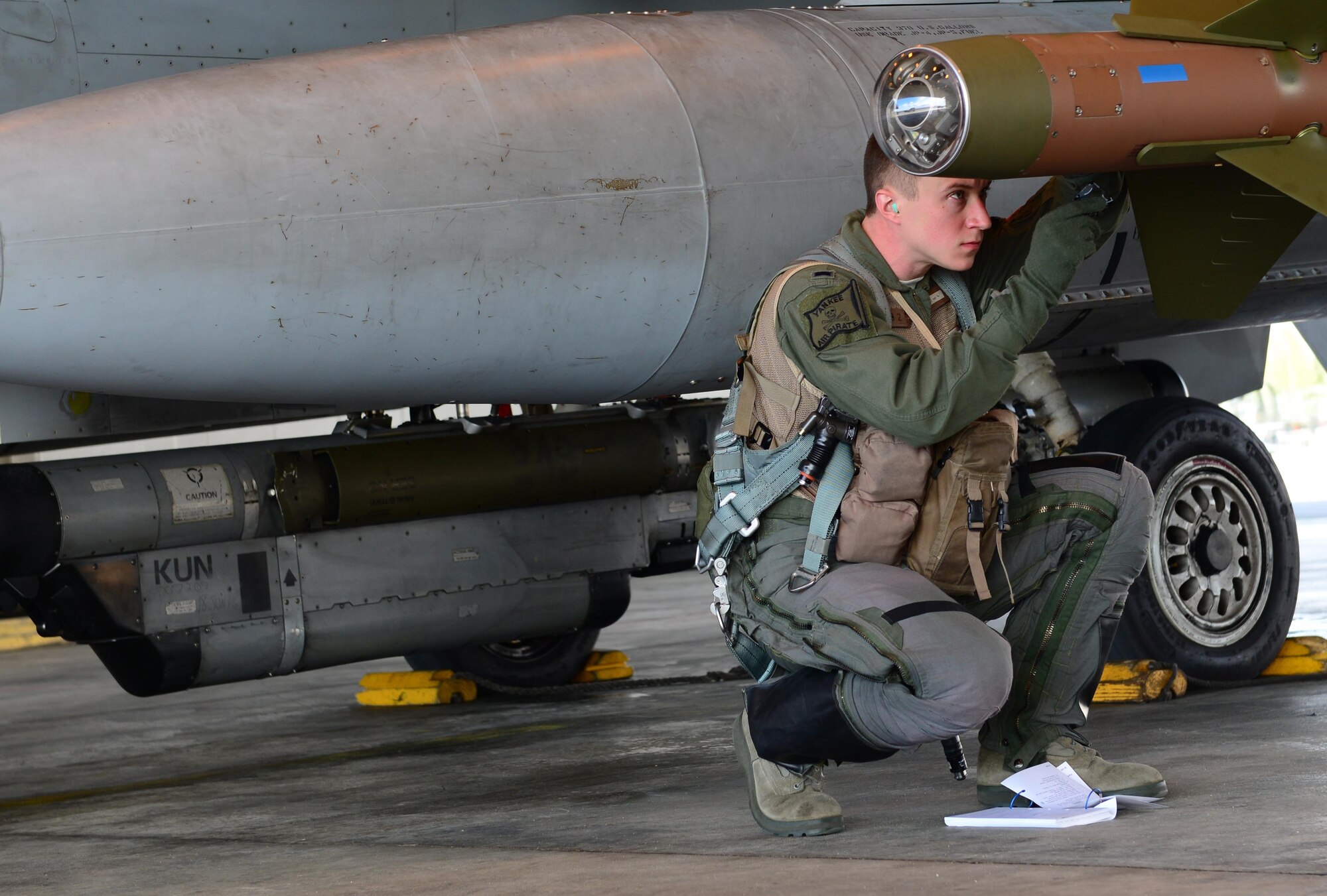 U.S. Air Force 1st Lt. Jacob “Hobs” Houder, a pilot assigned to the 80th Fighter Squadron, Kunsan Air Base, Republic of Korea, prepares for a flight May 5, 2016, at Eielson Air Force Base, Alaska. Houder is participating in his first RED FLAG-Alaska exercise; a series of Pacific Air Forces commander-directed field training exercises. (U.S. Air Force photo by Airman 1st Class Cassandra Whitman/Released)