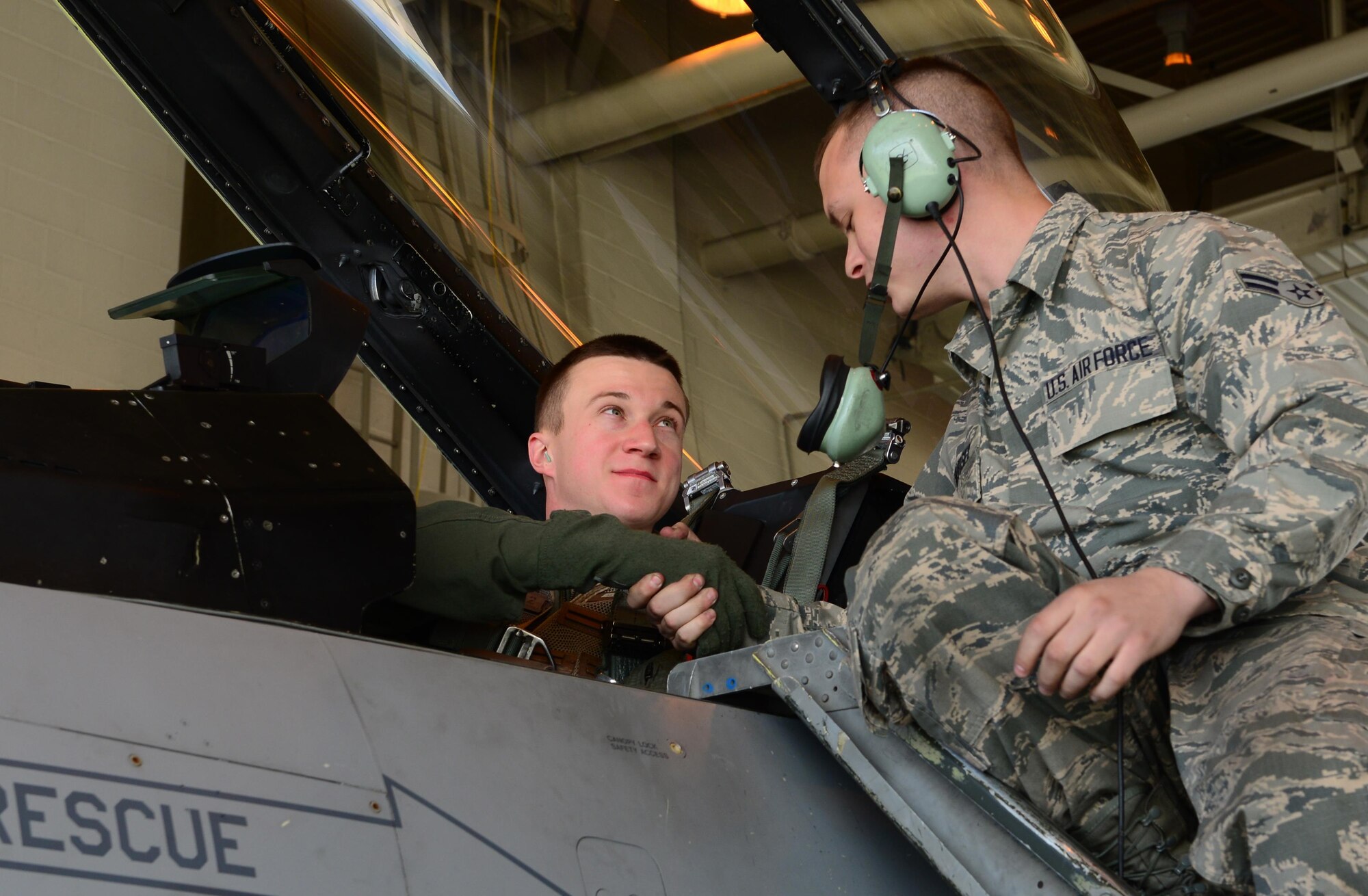 U.S. Air Force 1st Lt. Jacob “Hobs” Houder, a pilot assigned to the 80th Fighter Squadron, Kunsan Air Base, Republic of Korea, prepares for a flight May 5, 2016, at Eielson Air Force Base, Alaska. Houder is participating in his first RED FLAG-Alaska exercise, which provides combined offensive counter-air, interdiction, close air support and large force-employment training in a simulated combat environment. (U.S. Air Force photo by Airman 1st Class Cassandra Whitman/Released)
