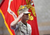 CAMP PENDLETON, Calif. -- Sgt. Maj. Scott R. Helms relinquishes his duties as acting sergeant major of Marine Corps Installations – West, Marine Corps Base Camp Pendleton to his successor Sgt. Maj. Julio E. Meza during a relief and appointment ceremony at the Paige Fieldhouse at Camp Pendleton, May 6, 2016. The relief and appointment ceremony was followed by the retirement ceremony for Sgt. Maj. Helms, who enlisted in the Marine Corps in 1985 and has served as Marine Corps Installations - West, Marine Corps Base Camp Pendleton's Sergeant Major since June 2013. (Marine Corps Photo by Cpl. Asia Soreson)