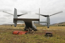 Marines with Marine Medium Tiltrotor Squadron (VMM) 165 prepare the Bambi bucket for the 2016 Wildland Firefighting Exercise aboard Marine Corps Base Camp Pendleton, Calif., May 5. The exercise was a multiaircraft operation with both ground and air units working together for maximum firefighting efforts. (U.S. Marine Corps photo by Lance Cpl. Harley Robinson/Released)