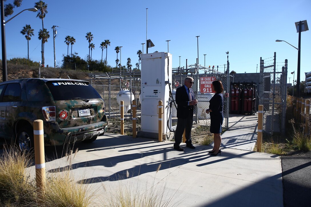 Ms. Christine Harada, Chief of Federal Sustainability Officer, right, receives a brief from Mr. Gary Funk, left, on the Hydrogen Refueling Station aboard Camp Pendleton, Calif., Dec. 29, 2015. The purpose of the visit was to provide the new White House Federal Chief Sustainability Officer information and background regarding Marine Corps Installations West-Marine Corps Base Camp Pendleton’s electric vehicle procurement, renewable energy, and how water sustainability programs support the Untied States Marine Corps mission and readiness. (U.S. Marine Corps Photo by Gunnery Sgt. Evan P. Ahlin/Released)