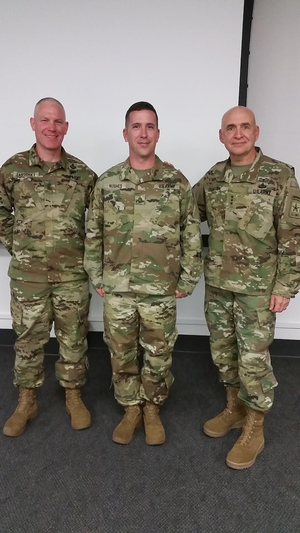 Sgt. 1st Class William Hughes poses with Army Inspector General Lt. Gen. David E. Quantock and Sgt. Maj. Dennis Zavodsky, Office of the Inspector General for the Army, April 21, 2016, Ft. Belvoir, Va. Hughes won the 2016 Army National Guard Inspector General Soldier of the Year during the annual National Guard Bureau Inspector General Soldier of the Year competition. 