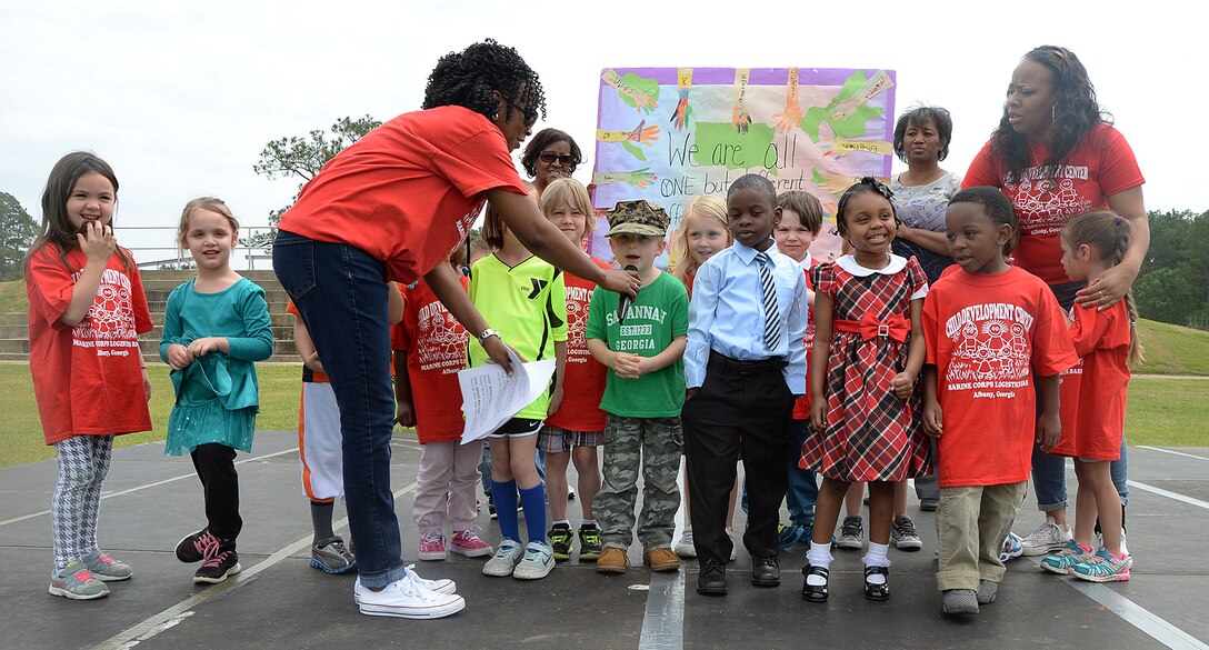 A child from the Marine Corps Logistics Base Albany Child Development Center introduces himself as a future Marine. The annual event is held to educate individuals on diversity and celebrate differences.