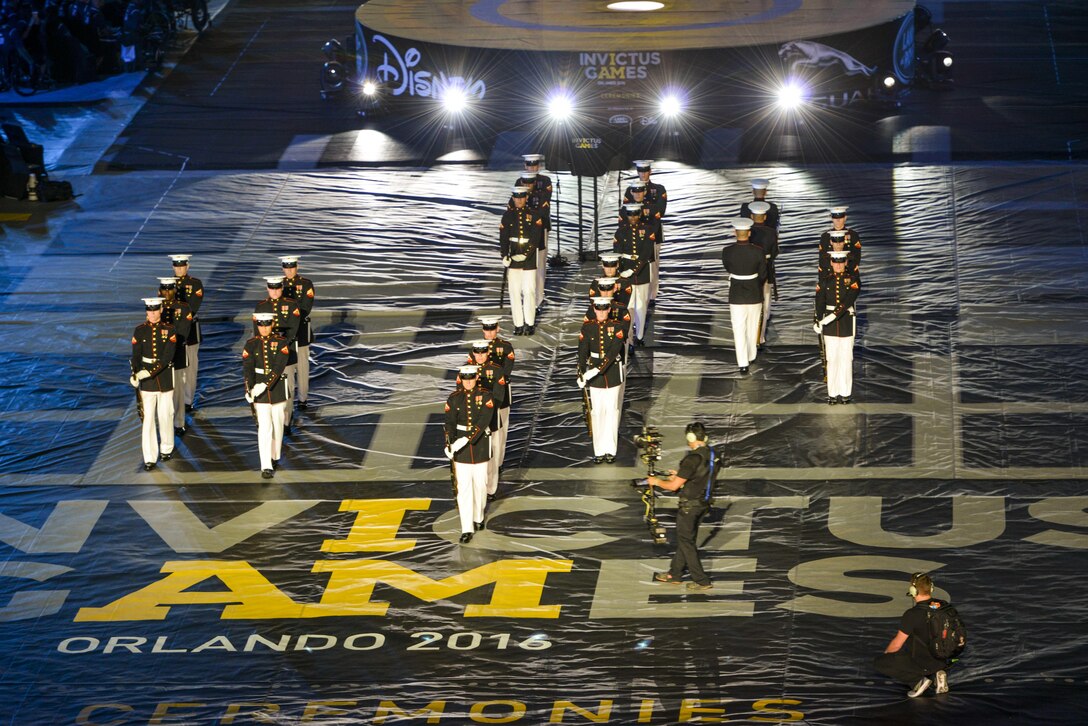 160508-F-WU507-152: The U.S. Marine Corps Silent Drill Platoon, from Marine Barracks Washington, D.C., performs during the opening ceremony for the 2016 Invictus Games at the ESPN Wide World of Sports complex at Walt Disney World, Orlando, Fla., May 8, 2016.  The 2016 Invictus Games officially kicked off with the ceremony and 15 nations will compete over the next five days in multiple adaptive sports events. (U.S. Air Force photo by Senior Master Sgt. Kevin Wallace/RELEASED)