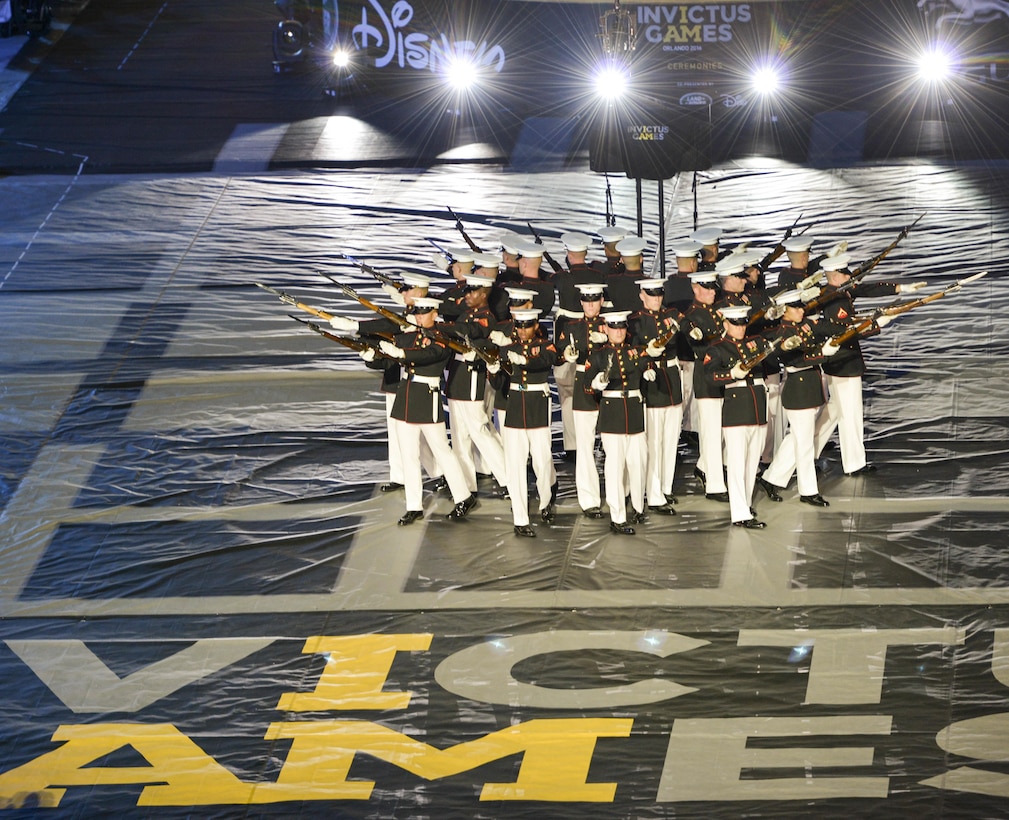 The U.S. Marine Corps Silent Drill Platoon, from Marine Barracks Washington, D.C., performs during the opening ceremony for the 2016 Invictus Games at the ESPN Wide World of Sports complex at Walt Disney World, Orlando, Fla., May 8, 2016.  The 2016 Invictus Games officially kicked off with the ceremony and 15 nations will compete over the next five days in multiple adaptive sports events. (U.S. Air Force photo by Senior Master Sgt. Kevin Wallace/RELEASED)