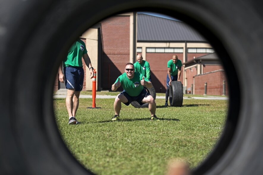 U.S. Air Force Capt. Alexander Barnett, 23d Aircraft Maintenance Squadron maintenance operations officer, poses for a photo, May 6, 2016, at Moody Air Force Base, Ga. The Maintenance Professional of the Year festivities kicked off with a Super Sports day, where Airmen competed in physical challenges for bragging rights. (U.S. Air Force photo by Airman 1st Class Janiqua P. Robinson/Released)