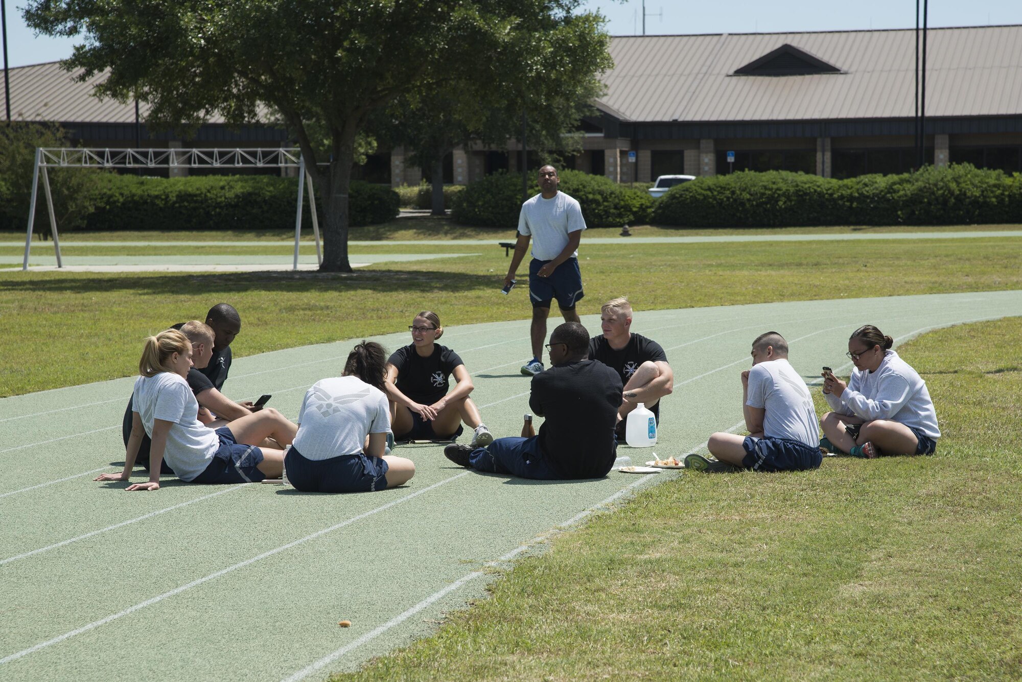 U.S. Air Force Airmen take a load off after a challenging sports day, May 6, 2016, at Moody Air Force Base, Ga. The day gave Airmen the opportunity to compete for bragging rights before the Maintenance Professional of the Year ceremonies later that evening. (U.S. Air Force photo by Airman 1st Class Janiqua P. Robinson/Released)