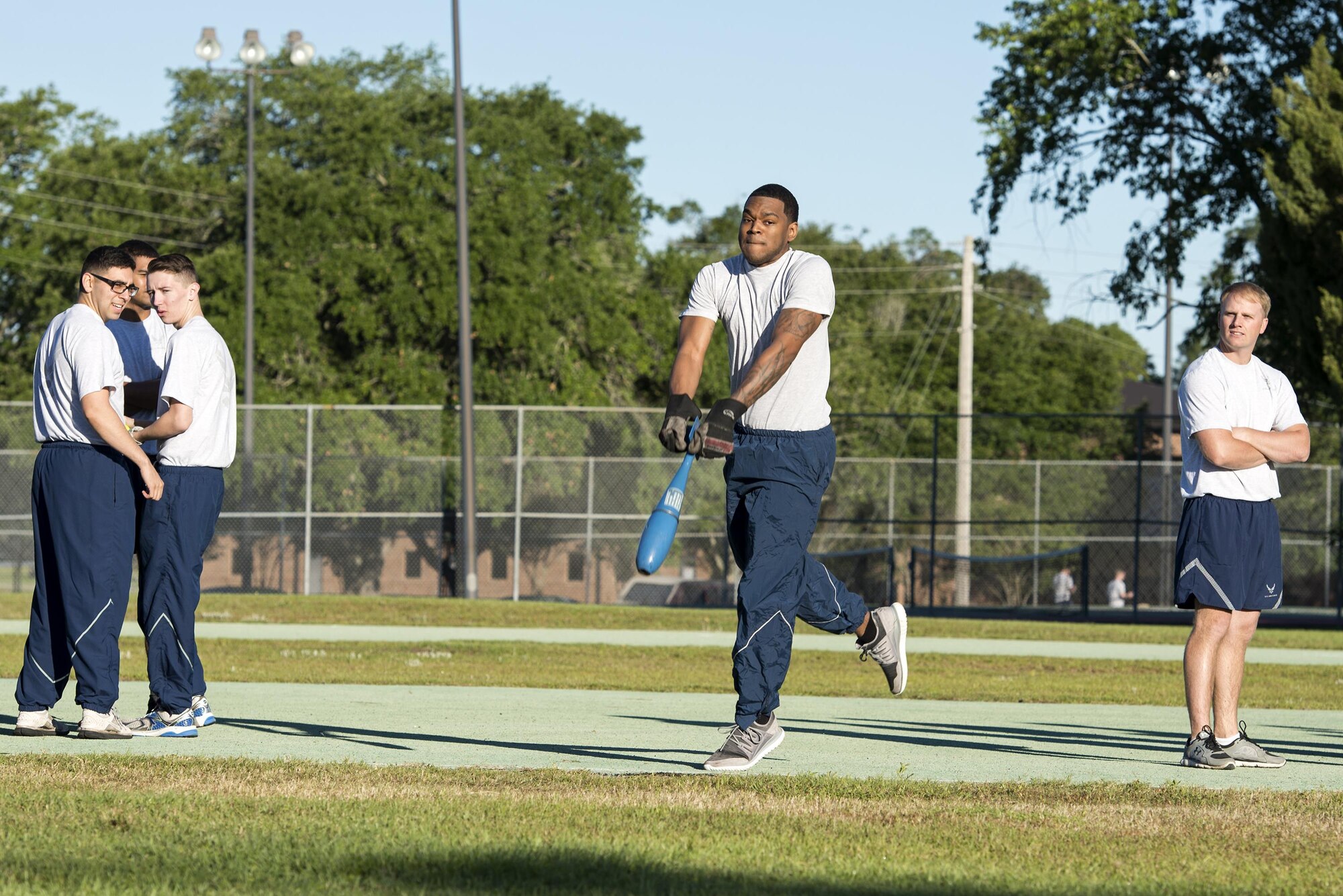 U.S. Air Force Senior Airman Bryson March from the 723d Aircraft Maintenance Squadron, participates in the ammo shot-put challenge, May 6, 2016, at Moody Air Force Base, Ga. Participants threw an inert ammunition as far as they could and measured the distance at the initial bounce. (U.S. Air Force photo by Airman 1st Class Janiqua P. Robinson/Released)