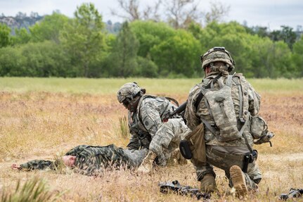 238th Transportation Company Soldiers practice searching a simulated foreign Soldier at Fort Hunter Liggett, Calif., during Warrior Exercise, May 7, 2016. This annual exercise is designed for units to practice technical skills in a tactical environment under simulated combat conditions.