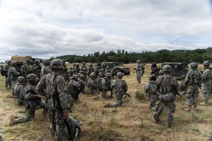 Col. Jon Hewitt, Deputy Commanding Officer, 311th Sustainment Command (Expeditionary), met with the 238th Transportation Company at Fort Hunter Liggett, Calif. to discuss the importance of their training in light of current world events. The 238th TC is participating in the Warrior Exercise which is designed for units to practice technical skills in a tactical environment under simulated combat conditions.