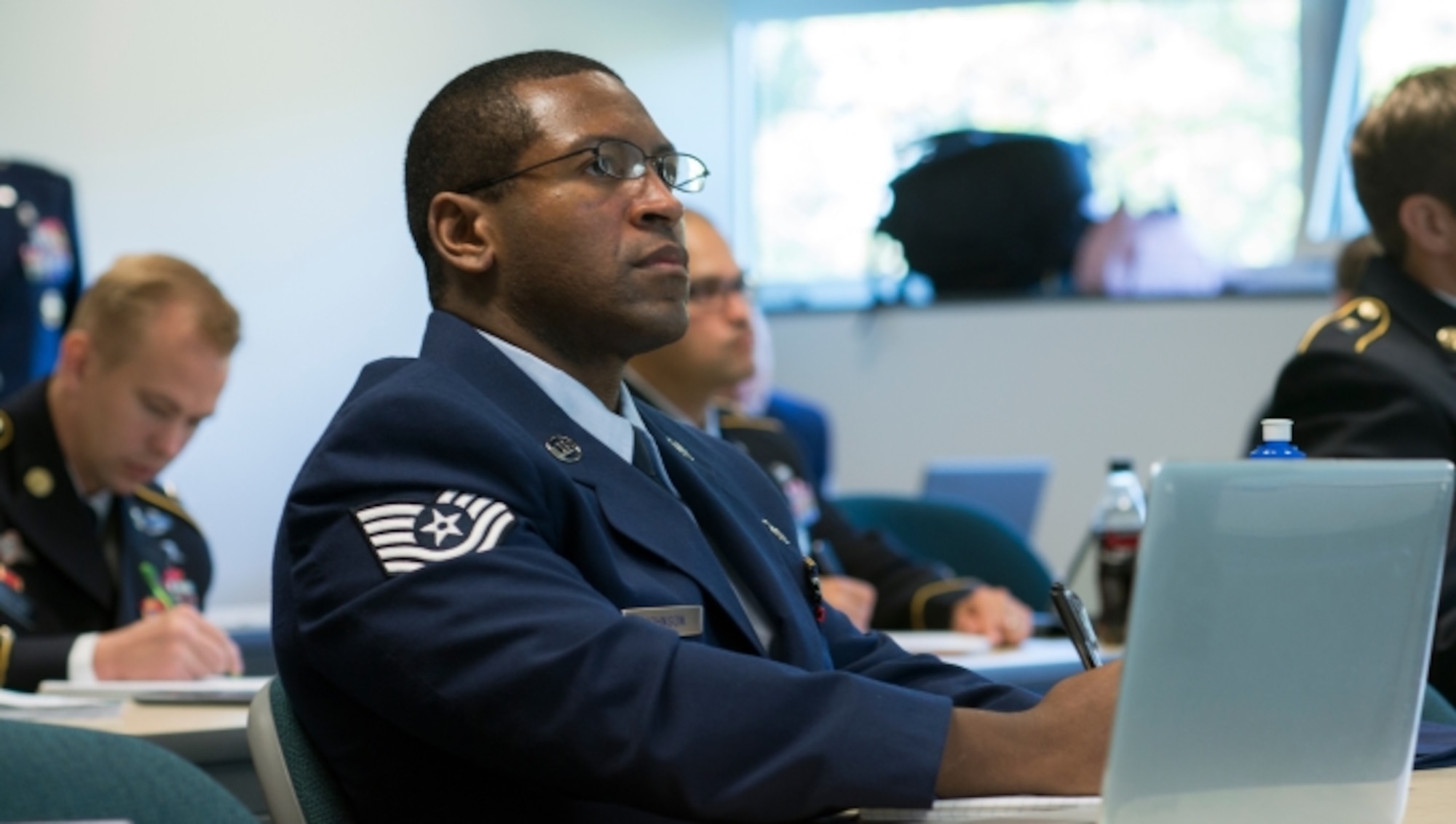 Tech. Sgt. Kenneth Johnson attends class at George Mason as part of the Enlisted to Medical Degree Preparatory Program. The Enlisted to Medical Degree Preparatory Program is a partnership between the Armed Services and Uniformed Services University. Designed for enlisted service members, the two-year program enables members to remain on active duty status while enrolled as full-time students in preparation for application to medical school. (Courtesy photo)