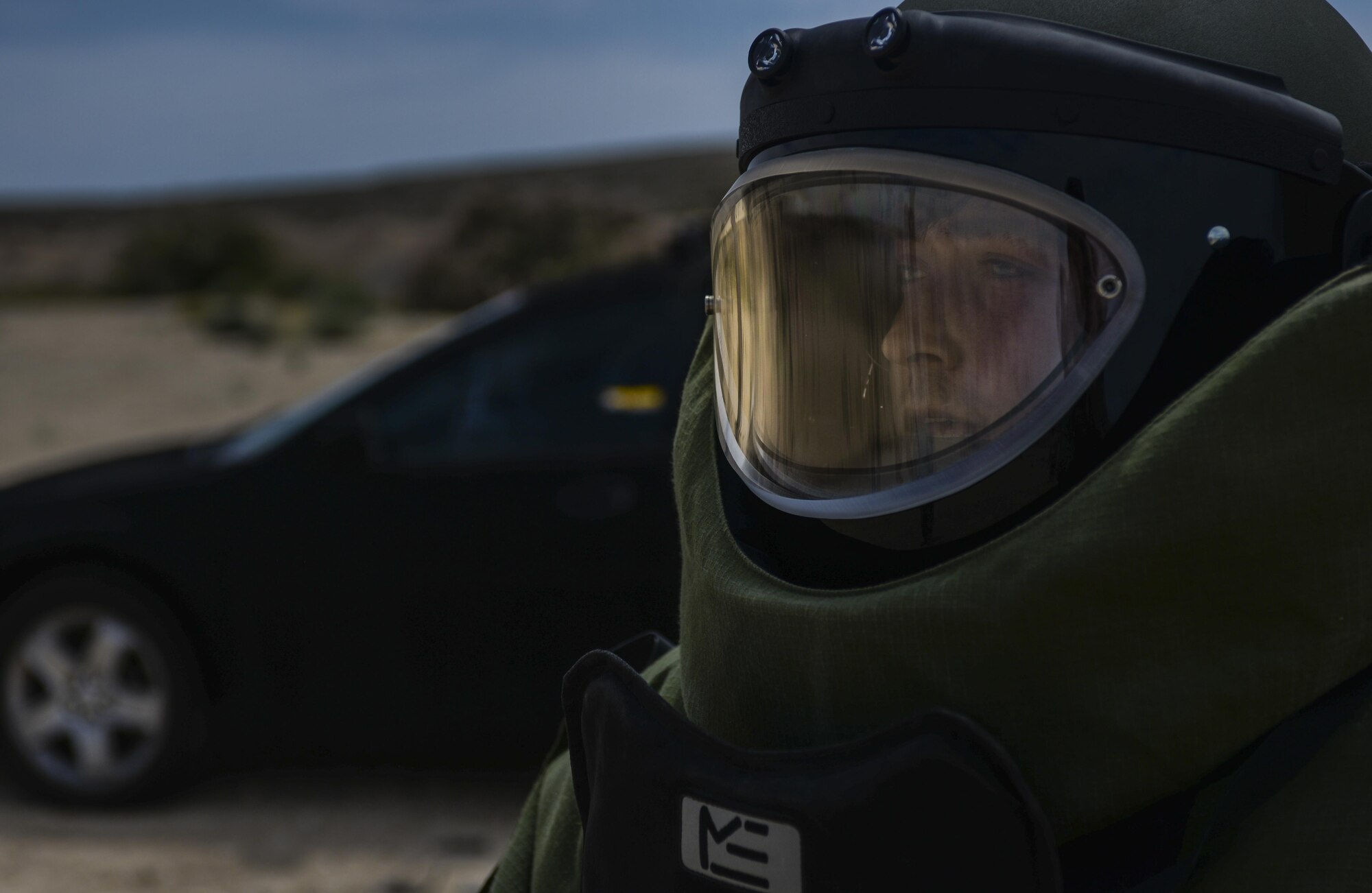 Staff Sgt. John Mitchell, 99th Civil Engineer Squadron explosive ordinance technician, wears an EOD suit during a training exercise at Nellis Air Force Base, Nev., May 5, 2016. Trained to detect, disarm, detonate and dispose of explosive threats all over the world, EODs are the specialists who bravely serve as the Air Force’s bomb squad. (U.S. Air Force photo by Airman 1st Class Kevin Tanenbaum)
