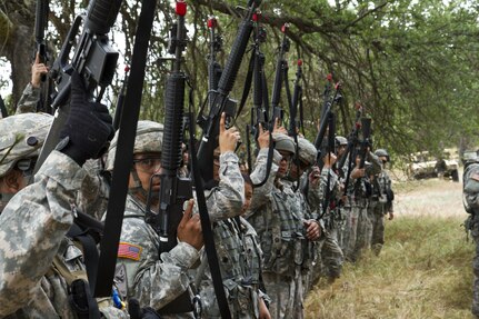 U.S. Army Soldiers from the 238th Transportation Company (TC) count off weapons after a sucessful exercise on Fort Hunter Liggett, Calif. on May 7, 2016. The 238th TC get accountability of their weapons after conducting an exercise to establish a Tactical Assembly Area and defending it from enemy forces, who attacked them. (U.S. Army photo by Spc. Sean McCallon, 91st Training Division public affairs.)