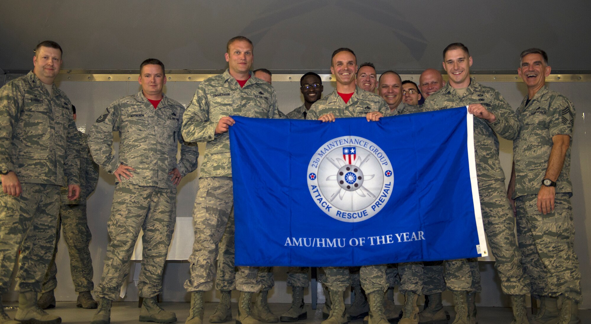 U.S. Air Force Col. Shane Barrett, 23d Maintenance Group commander, presents the 23d MXG Aircraft Maintenance Unit/Helicopter Maintenance Unit of the Year award to the 75th AMU during the 2016 Maintenance Professional of the Year, May 6, 2016, at Moody Air Force Base, Ga.  The 75th AMU performs all on-equipment maintenance, weapons loading and support activities for Moody’s A-10C Thunderbolt IIs. (U.S. Air Force photo by Airman 1st Class Greg Nash/Released) 