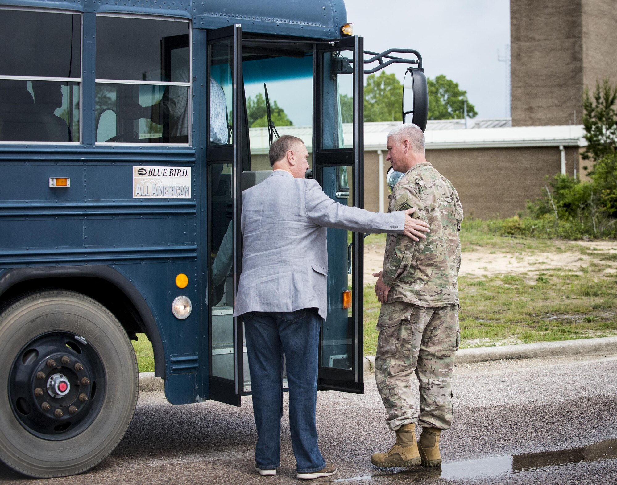 Col. David Hanson, 919th Special Operations Wing vice commander, visits with Okaloosa County Commissioner Wayne Harris as they board an Air Force bus during the 919th Special Operations Wing Civic Leader Tour at Duke Field, Fla. April 22.  Each year, the wing invites local civic leaders to spend a day learning more about the wing’s Citizen Air Commandos and their roles in national defense. (U.S. Air Force photo/Tech. Sgt. Jasmin Taylor)