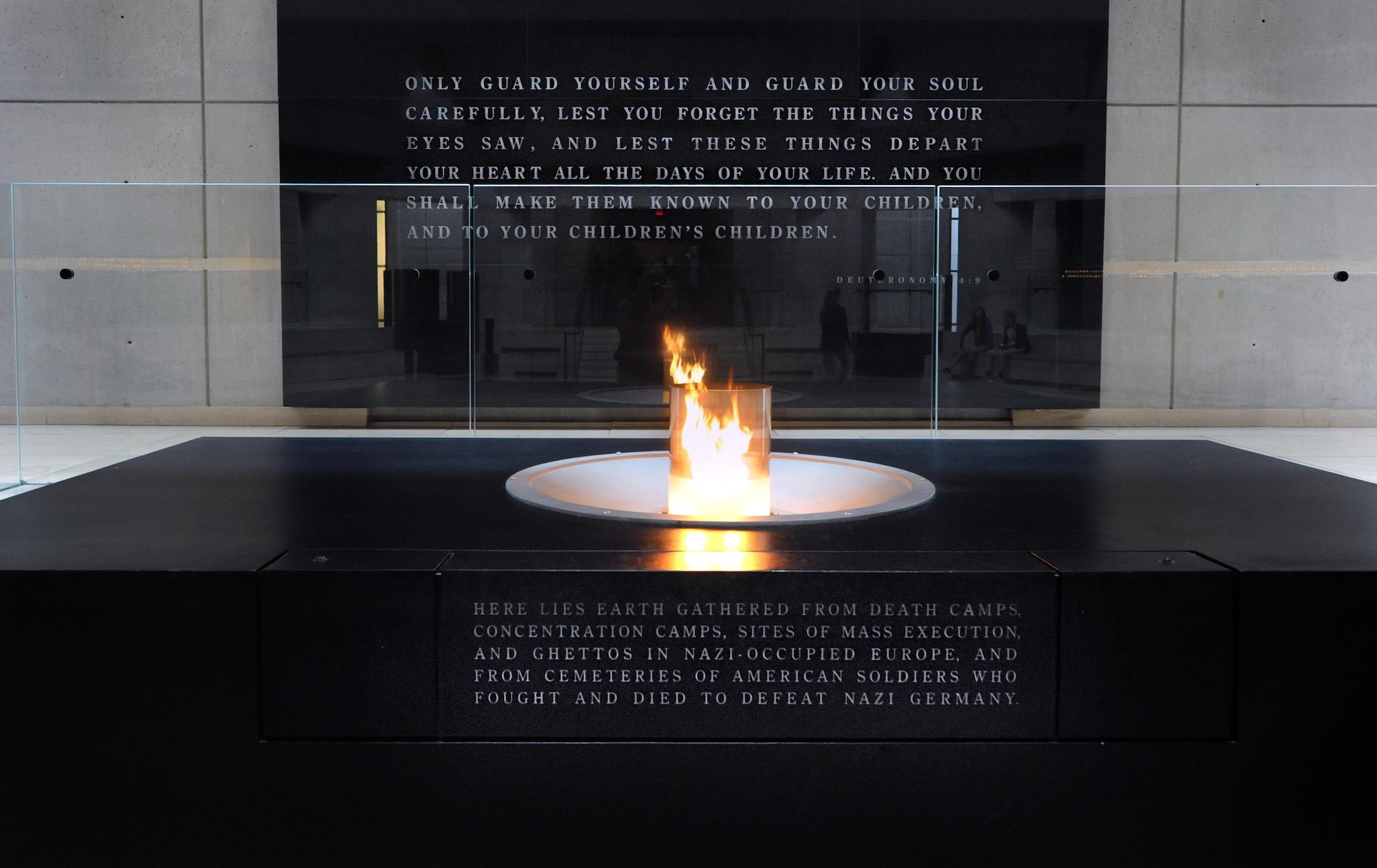 An eternal flame burns inside the Hall of Remembrance at the United States Holocaust Memorial located in Washington D.C. The memorial reminds visitors to never forget the Holocaust and how events like this can be prevented if you remember the past. (Department of Defense photo by Marvin Lynchard)