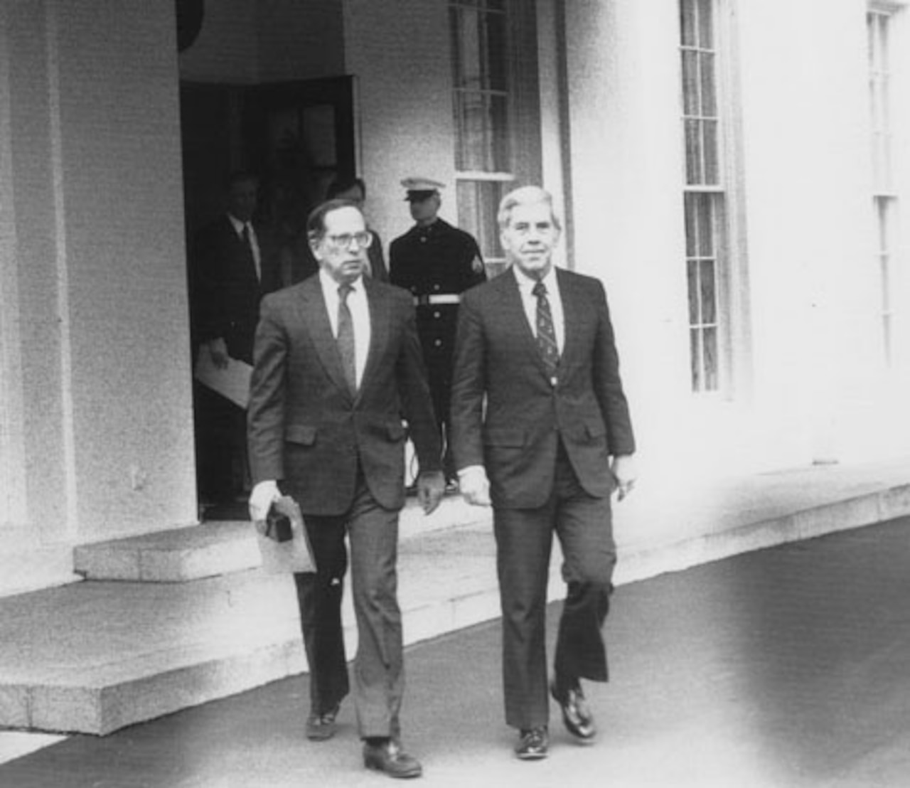 Then-U.S. Sens. Sam Nunn, left, and Richard Lugar leave the White House in 1991 after briefing then-President George H.W. Bush on their cooperative threat reduction legislation. U.S. Senate photo