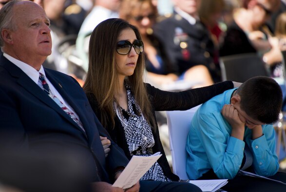 The family of fallen Marine explosive ordnance disposal technician Staff Sgt. David Lyon attends the 47th annual EOD Memorial Service at the Kauffman EOD Training Complex on Eglin Air Force Base, Fla., May 7, 2016. Lyon, who suffered wounds while deployed to Afghanistan, was one of six names of recent and past fallen EOD technicians added to the memorial wall this year. The total now stands at 320. (U.S. Air Force photo/Samuel King Jr.)