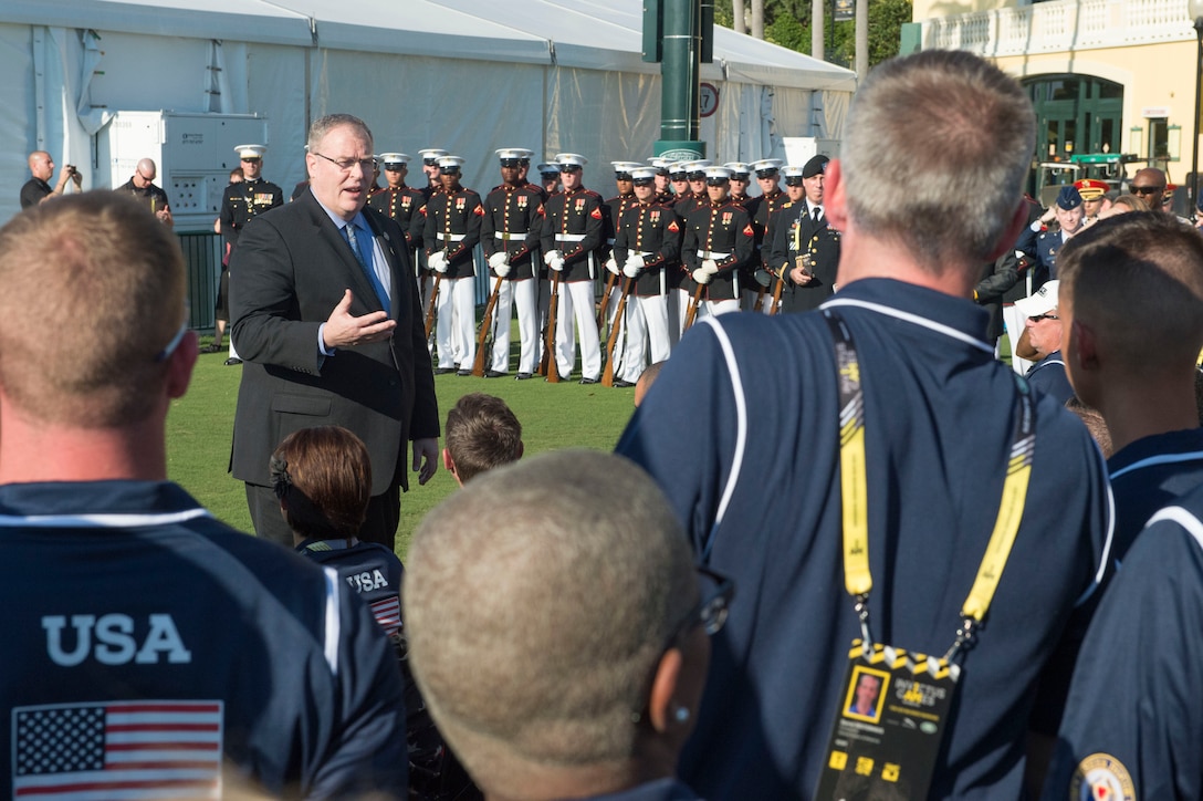 Deputy Defense Secretary Bob Work speaks with members of the U.S. Team before the 2016 Invictus Games opening ceremony in Orlando, Fla., May 8, 2016. DoD photo by Navy Petty Officer 1st Class Tim D. Godbee