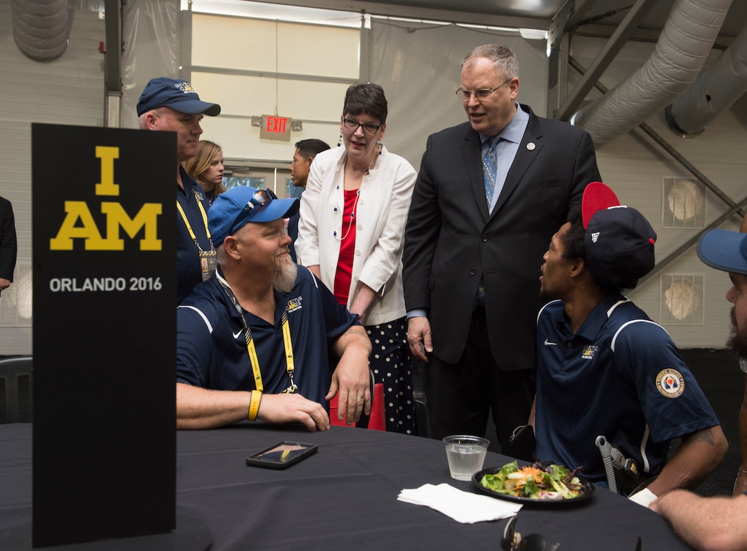 Deputy Defense Secretary Bob Work meets with Team USA athletes at the 2016 Invictus Games in Orlando, Fla., May 8, 2016. DoD photo by Navy Petty Officer 1st Class Tim D. Godbee