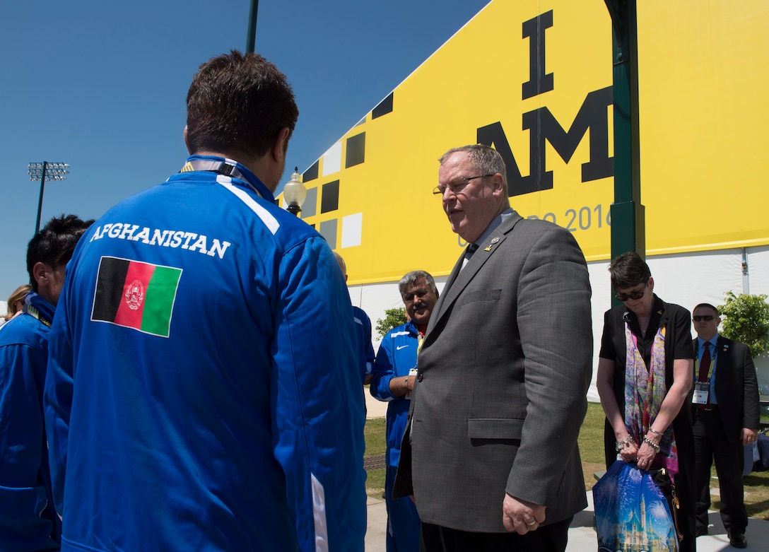 Deputy Defense Secretary Bob Work speaks with members of Team Afghanistan at the 2016 Invictus Games in Orlando, Fla., May 8, 2016. DoD photo by Navy Petty Officer 1st Class Tim D. Godbee