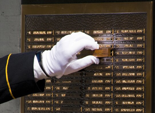Another Soldier’s name is unveiled at the 47th annual Explosive Ordnance Disposal Memorial Service at the Kauffman EOD Training Complex on Eglin Air Force Base, Fla., May 7, 2016. Names of recent and past fallen EOD technicians are added to the memorial wall during the ceremony each year. The Army, Marines and Navy added six new names this year. The total now stands at 320. (U.S. Air Force photo/Samuel King Jr.)