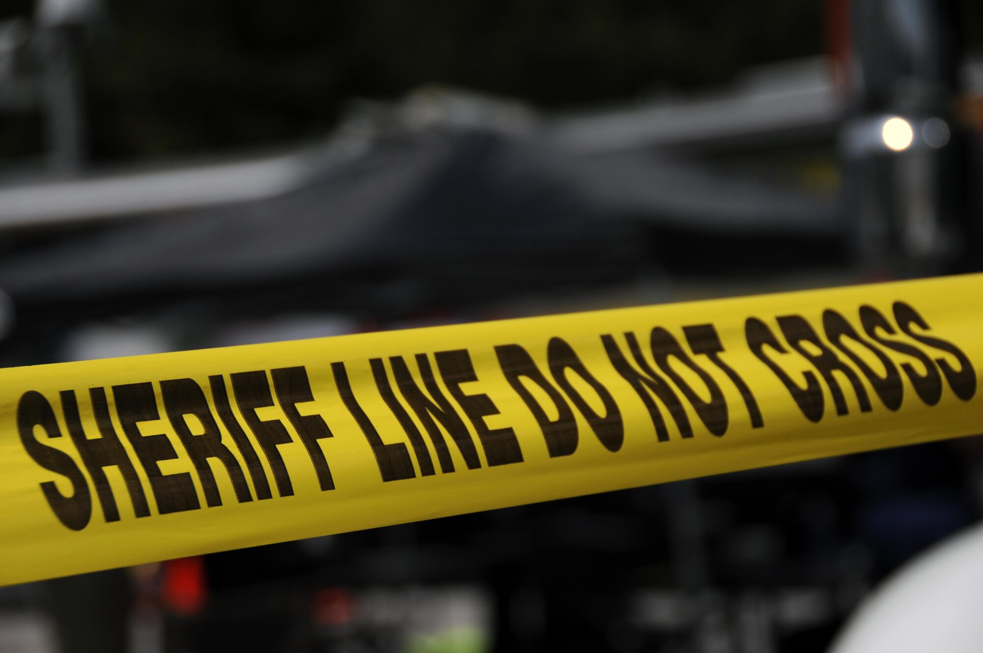 Caution tape marks a simulated emergency area during the 2016 Statewide Mobile Communication Vehicle Functional Field Exercise, held at Stone Mountain, Ga., May 3-6. The 94th Emergency Management staff and 94th Communications Squadron participated in the exercise, which was designed to test on-the-scene communication capability between the federal, state, and local emergency response organizations that participated. (U.S. Air Force photo/ Staff Sgt. Alan Abernethy)