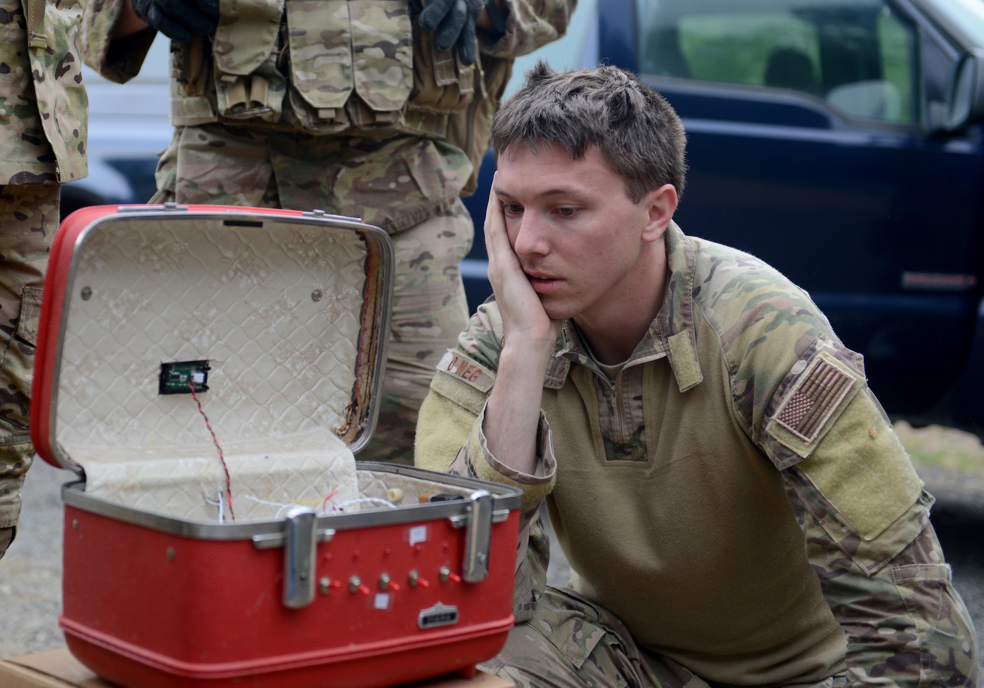 Staff Sgt. David Dezwaan, 60th Civil Engineer Squadron explosive ordnance disposal technician, inspects the wiring of a simulated radioactive dispersal device during an exercise May 5th, 2016, at Clear Lake, California. Dezwaan and other EOD technicians were able to eliminate the threat of numerous improvised explosive devices and the radioactive dispersal device during Operation: Half-Life, an exercise designed to evaluate a synchronized, multi-agency response to a crisis situation. (U.S. Air Force photo by Senior Airman Bobby Cummings)