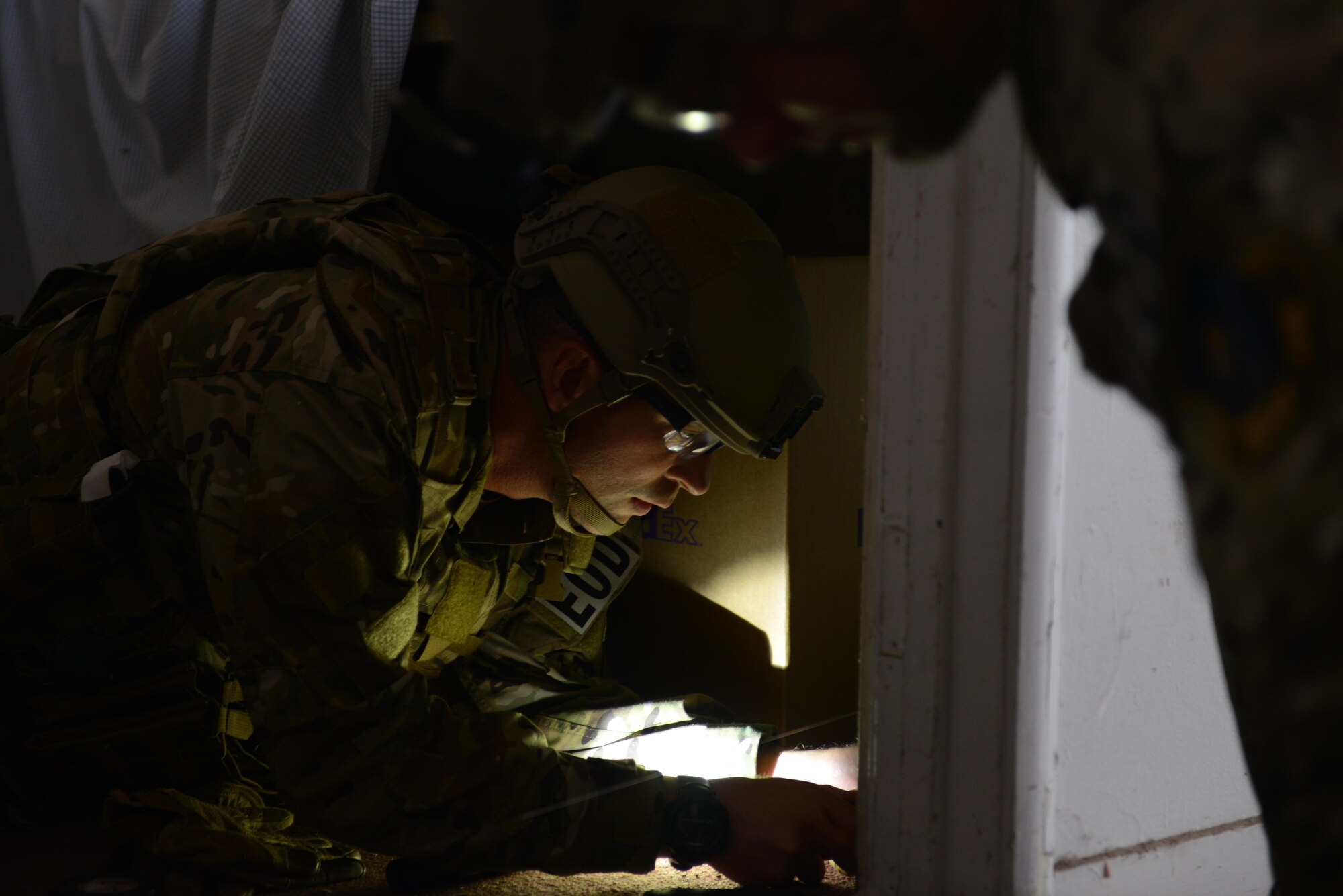 Tech. Sgt. Noah Cheney, 9th Civil Engineer Squadron explosive ordnance disposal technician, diffuses a simulated improvised explosive device May 5th, 2016, at Clear Lake, California. Cheney was participating in Operation: Half-Life, an exercise designed to evaluate a synchronized, multi-agency response to a crisis situation. (U.S. Air Force photo by Senior Airman Bobby Cummings)