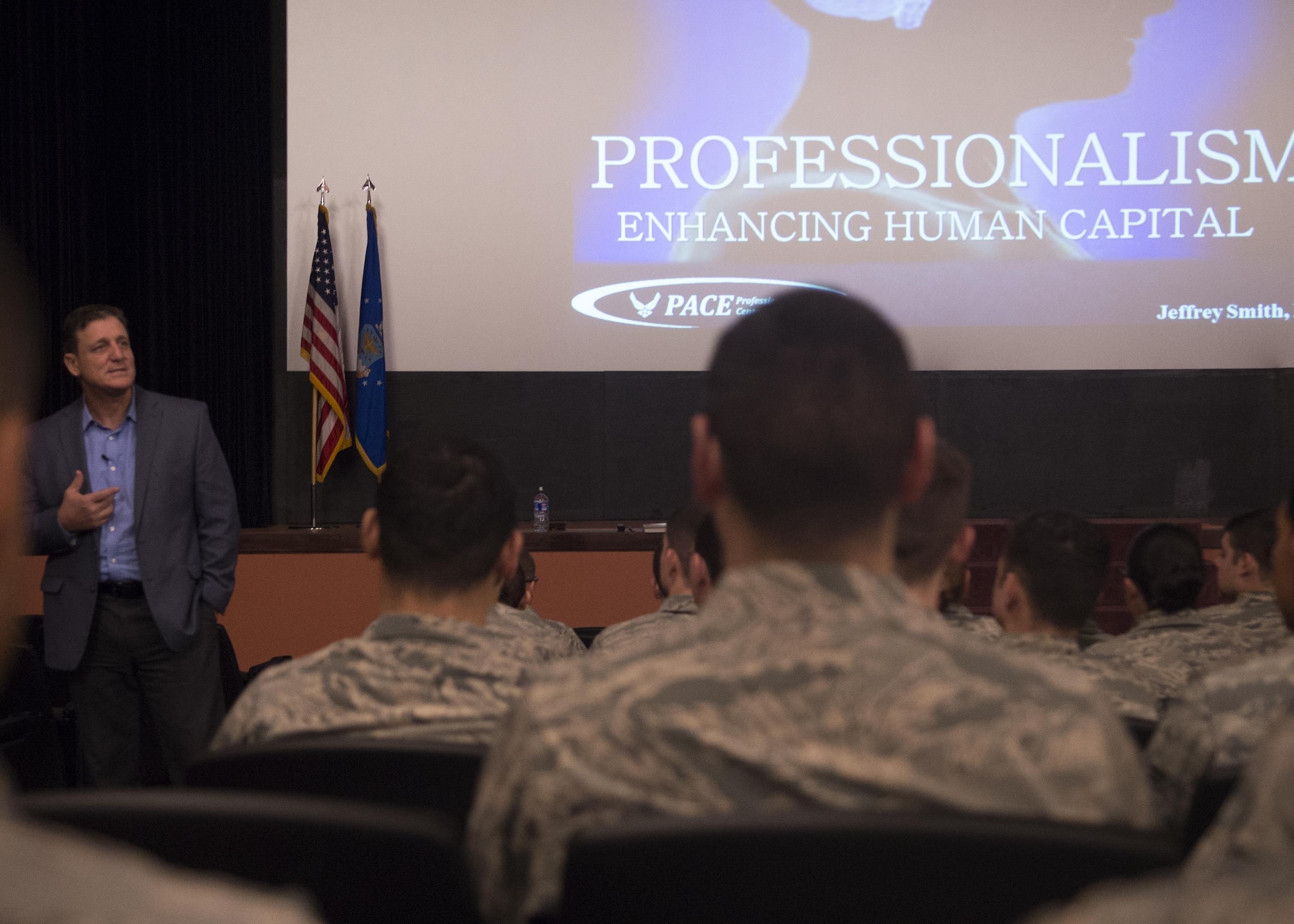 Jeffrey Smith, PACE senior executive advisor, speaks to a group of Airmen during one of several seminars on Enhancing Human Capital, presented by the Profession of Arms Center of Excellence, May 3, 2016, in the F.E. Warren Air Force Base, Wyo., theater. Smith spoke about a number of topics including leadership skills, values and how to take care of your people, both at work and at home. (U.S. Air Force photo by Airman 1st Class Malcolm Mayfield)